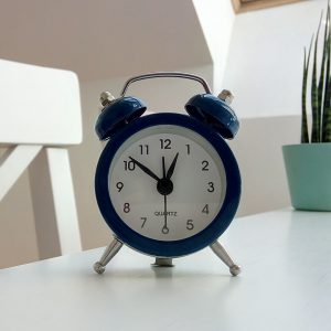 Classic alarm clock on a table